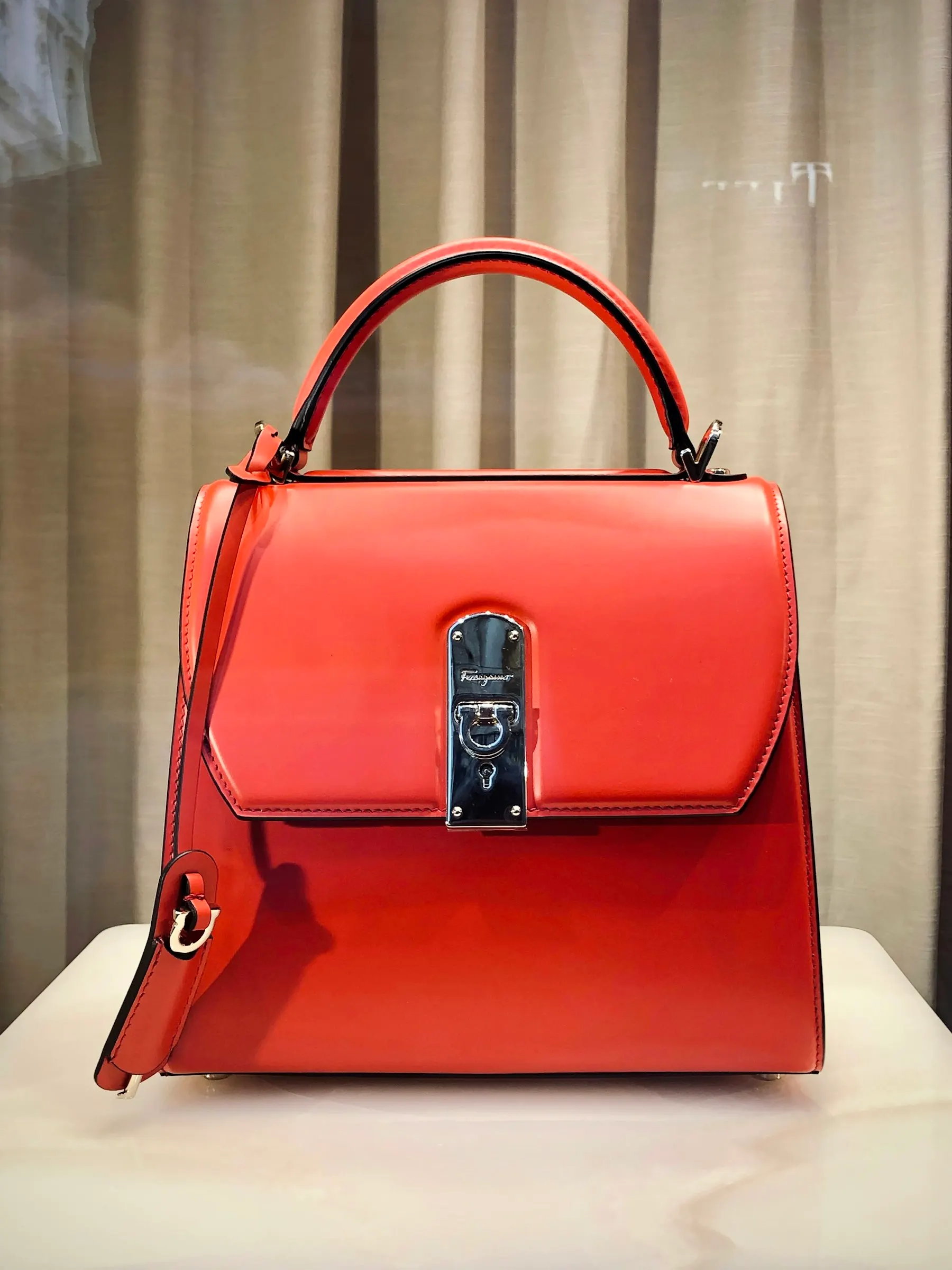 Orange leather satchel bag